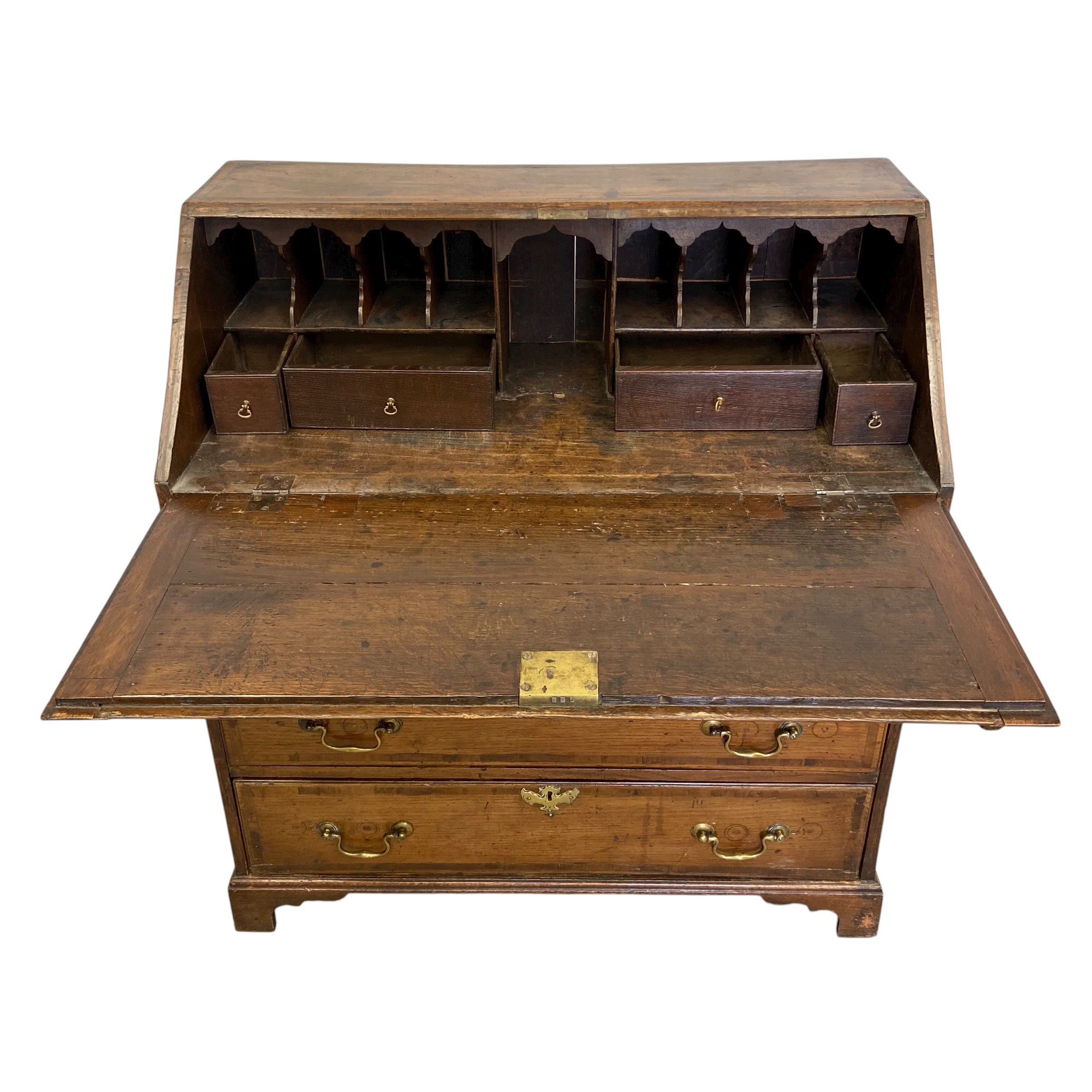 A Georgian oak bureau with fall front enclosing fitted interior over four long graduating drawers - Image 2 of 6