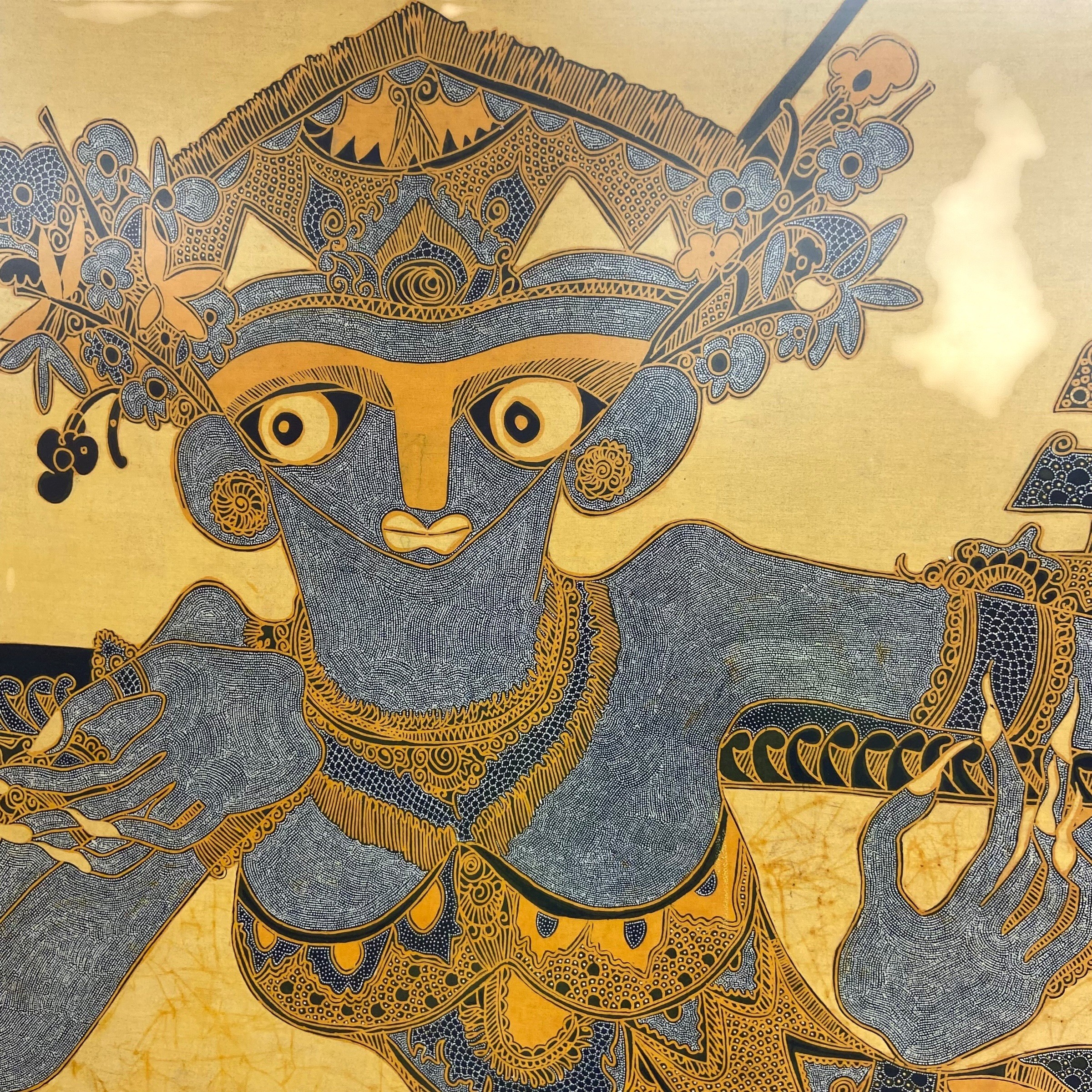 A large 1970s Indonesian batik fabric painting depicting a deity or figure from folklore. Signed and - Image 2 of 4