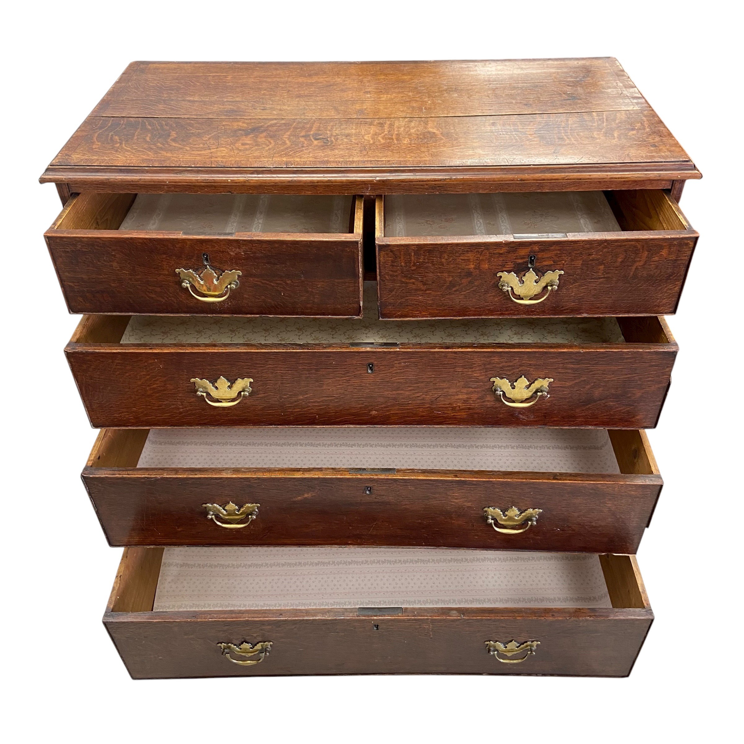 A Georgian oak chest of two short over three long cockbeaded drawers raised on bracket supports. H. - Image 2 of 4