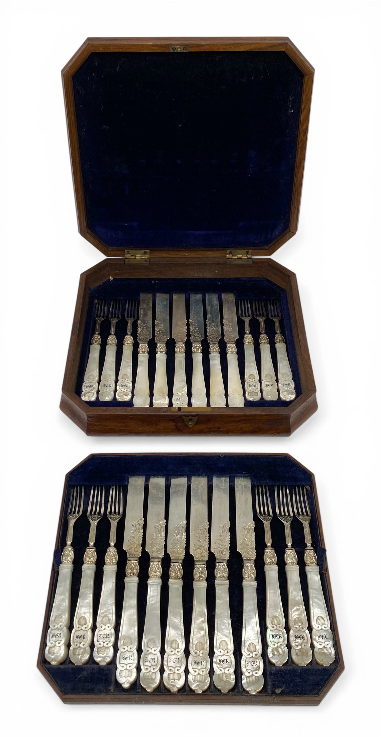 A Victorian hallmarked sterling silver dessert cutlery service with carved mother-of-pearl handles