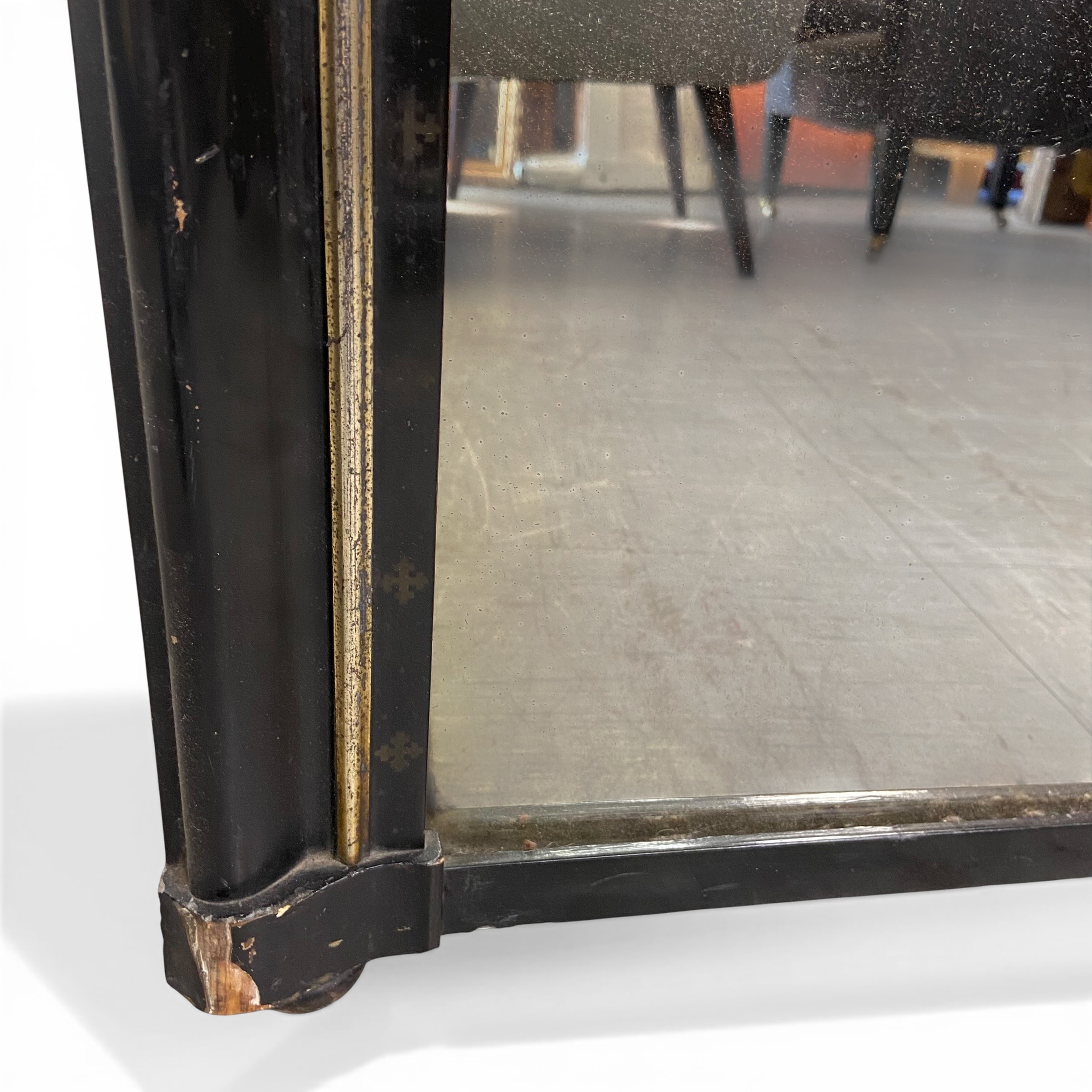 A late 19th century overmantel mirror with shaped plate in a black lacquered and gilt frame. - Image 2 of 3