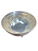 A Continental 830 marked white metal bon-bon dish with chased leaf decoration raised on three pad