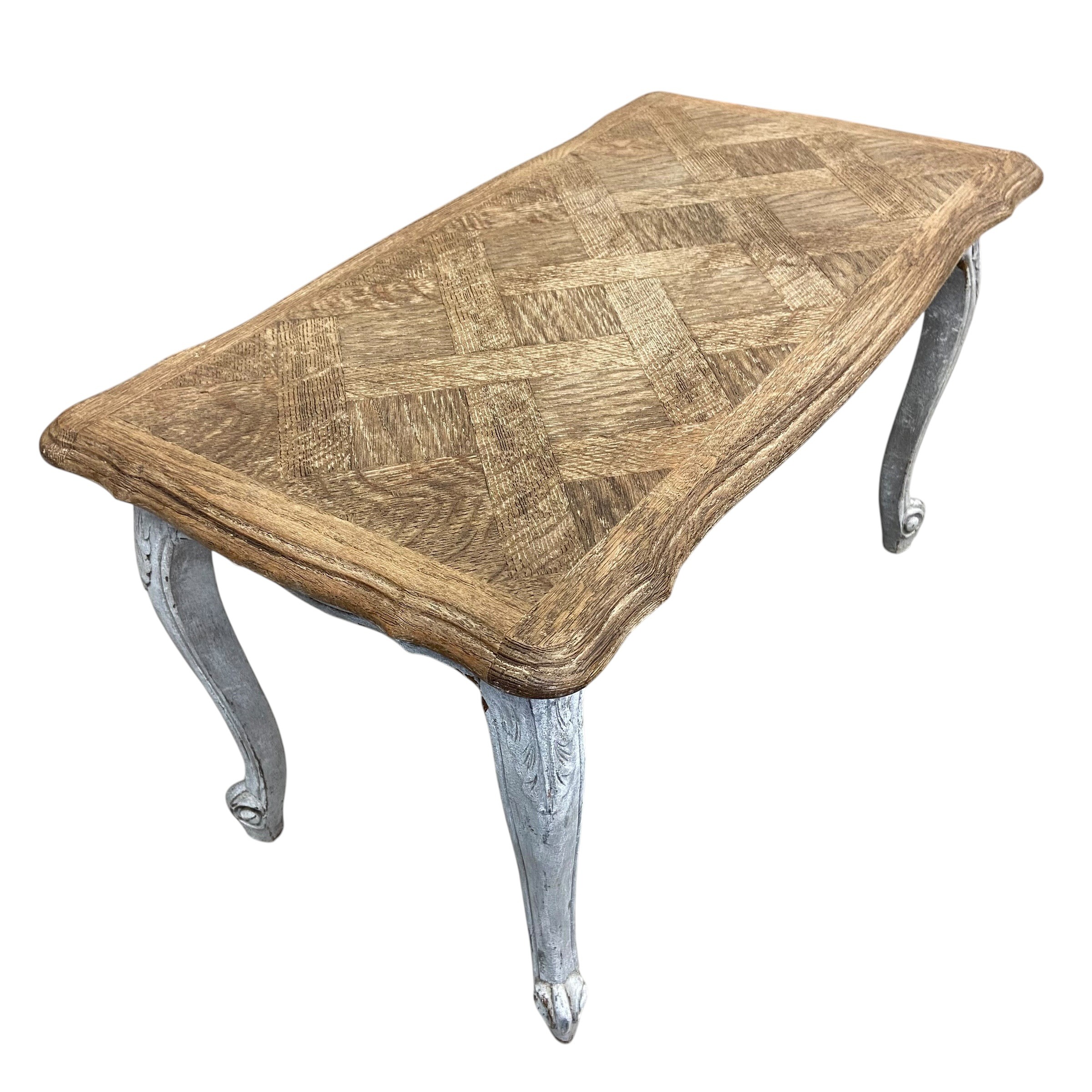 A vintage French farmhouse style coffee table with quatrefoil parquetry top raised on carved, - Image 3 of 4
