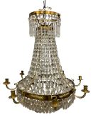 A 19th century wired Empire style basket chandelier with a cascade of cut glass drops suspended from