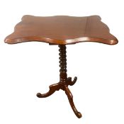 A 19th century mahogany occasional or lamp table with quatrefoil top over the barley-twist stem