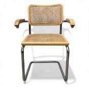 A vintage beech and cane Cesca armchair raised on a chrome cantilever base after the original design