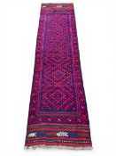 An Afghan Mashwani runner with diamond lozenge field over the midnight blue ground within a