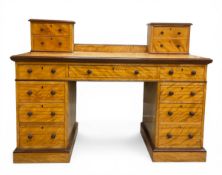 A late 19th century satinwood twin pedestal desk or dressing table with four superstructural drawers