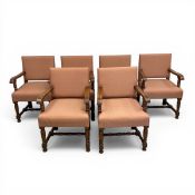 Maritime interest: A set of six early 20th century oak framed open armchairs - possibly from the