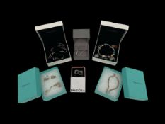 A mixed lot to include two sterling silver Tiffany & Co. necklaces and one bracelet together with