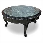 A 20th century coffee table with cirgular green marble top over the carved and shaped and ebonised