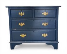 A late 19th century painted chest of two short over three long drawers raised on bracket supports.