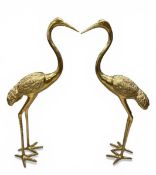 A pair of large vintage brass figural crane figures. H.105cm.