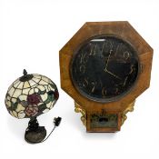 A 19th century walnut drop-dial wall clock with painted and gilt dial in an octagonal frame over the