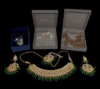 A mixed lot of vintage costume jewellery to include a Swarovski necklace in original box together