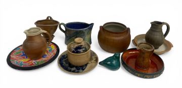 A mixed collection of studio pottery to include a salt-glazed stoneware jug by Jane Hamlyn, a hand