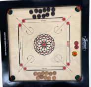 A vintage Surco Ellora tabletop Carrom board with chips. 70x70cm.