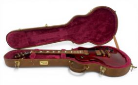 A vintage American maple-topped mahogany Gibson Les Paul 'Studio' electric guitar 2002, with