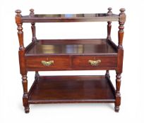 A 19th century three-tier mahogany buffet with two drawers raised on straight turned supports. H.