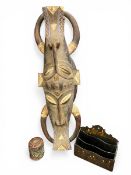 A 20th century hand carved African tribal mask with pigment together with a 19th century Japanese