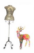 A contemporary decorative mirror mosaic mannequin together with a patchwork fabric reindeer