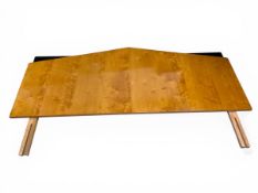 A vintage Spanish Biedermeier-style satinwood birch headboard of pitched form with ebonised