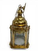 A 19th century style brass octagonal hall lantern. H.63 W.25 D.25cm.