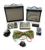 A vintage Fender Blues Junior guitar valve amplifier together with a Hohner Marlin HML 10L amp, a