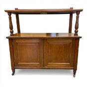 A Victorian mahogany two-tier whatnot buffett cupboard with turned superstructure over the pair of