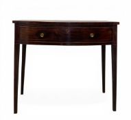 A 19th century mahogany side table with figure bowfronted top over the satinwood strung frieze