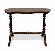 A 19th century mahogany occasional or centre table with lobed quatrefoil top raised on turned and