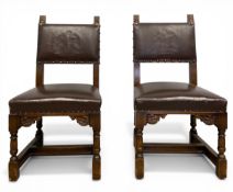 Maritime interest: A pair of early 20th century oak framed and brown leather upholstered executive