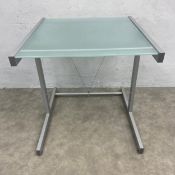 A vintage desk or computer table with frosted plate glass top raised on a silver metal frame. H.74