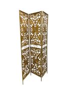 A vintage gold painted metal, scrolling openwork screen comprised of three folding panels. H.179 W.