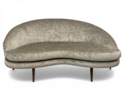 A contemporary Modernist style kidney shaped, silver-velour upholstered two-seater sofa raised on