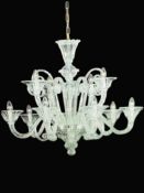 A vintage Venetian style hand blown transparent glass chandelier with nine branches.
