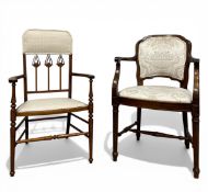 A C.1900 Arts & Crafts mahogany armchair with openwork tulip splats over the shaped arms and