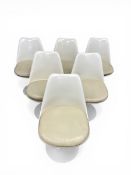 A set of six contemporary composite moulded and white painted metal Tulip swivel dining chairs
