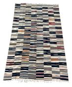 A contemporary flatweave carpet with allover geometric design. H.203 W.133cm
