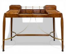 A burr walnut and rosewood crossbanded writing desk in the French Art Deco style with
