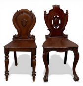 Two 19th century mahogany shield back hall chairs. H.91 W.45 D.46cm