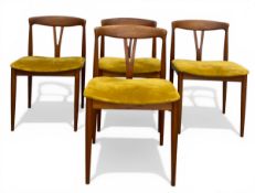 A set of four mid-century Danish teak 'Juliane' dining chairs each with shaped openwork wishbone