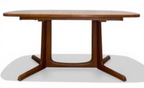 A mid-century Danish teak extending dining table with lozenge top raised on angular trestle supports