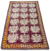 A 19th century Uzbek Suzani wedding cloth with three rows of six foliate medallions over a