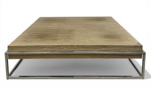 A contemporary Natuzzi coffee table on an angular chrome base. H.26 W.100 D.100cm
