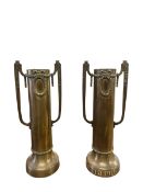 A pair of Soviet Russian WWI brass shell case trench art vases with engraved inscriptions C.1915.