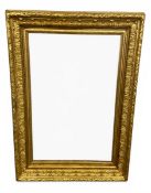 A large 19th century gilt gesso picture frame with allover foliate decoration and 'City of Sheffield
