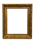 A 19th century gilt gesso picture frame with scrolling foliate decoration and acanthus leaf corners.