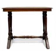 A 19th century mahogany occasional or centre table with canted top raised on turned and