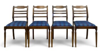 A set of four Regency style bar-back dining chairs each with marquetry inlaid top rail over the